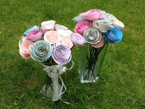 Paper flowers on the grass